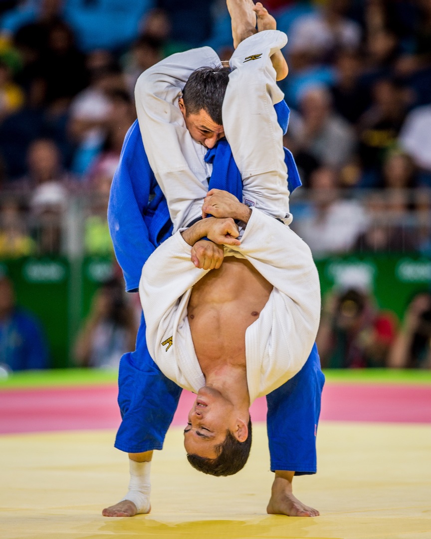 Two men at grappling competition